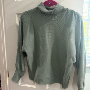 Green turtleneck